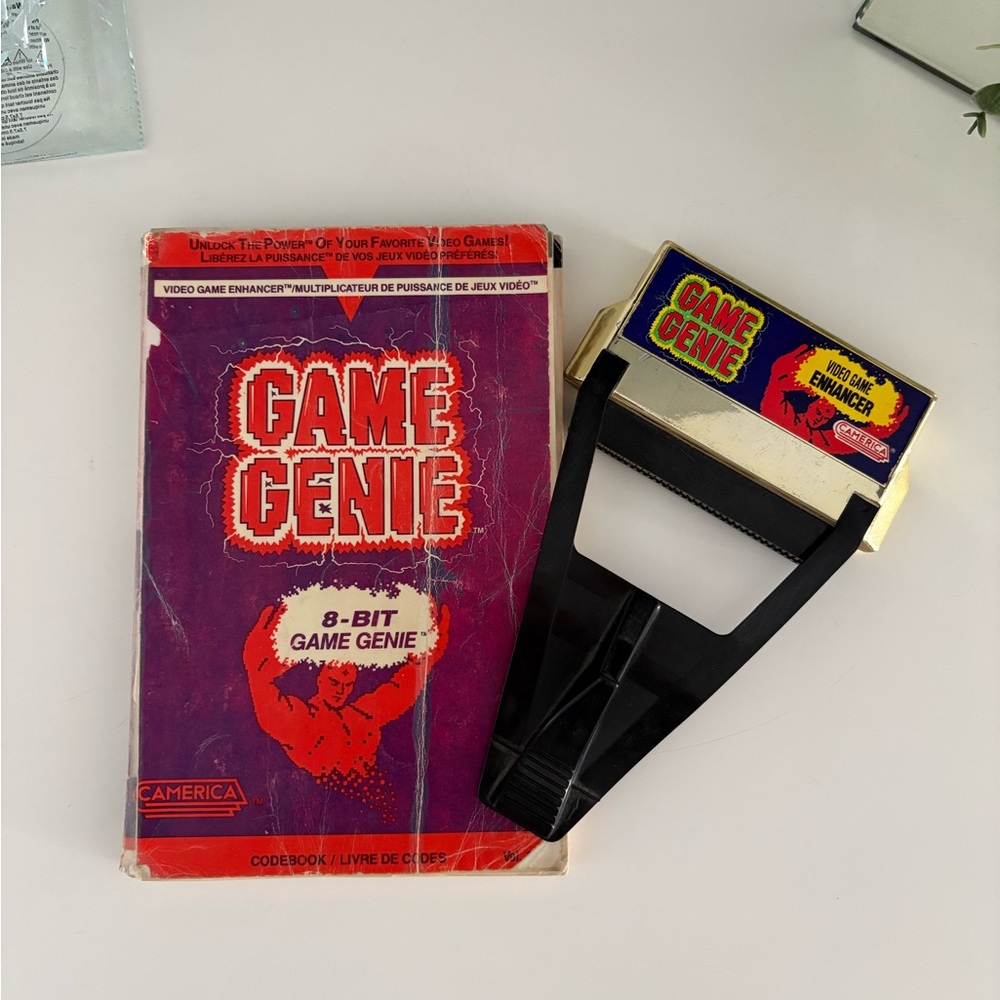 Game Genie with Manuel for Nintendo NES 8-Bit Game Enhancer - Black and Purple